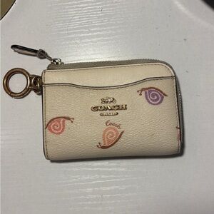 Coach Beige Wristlet with Gold Accents